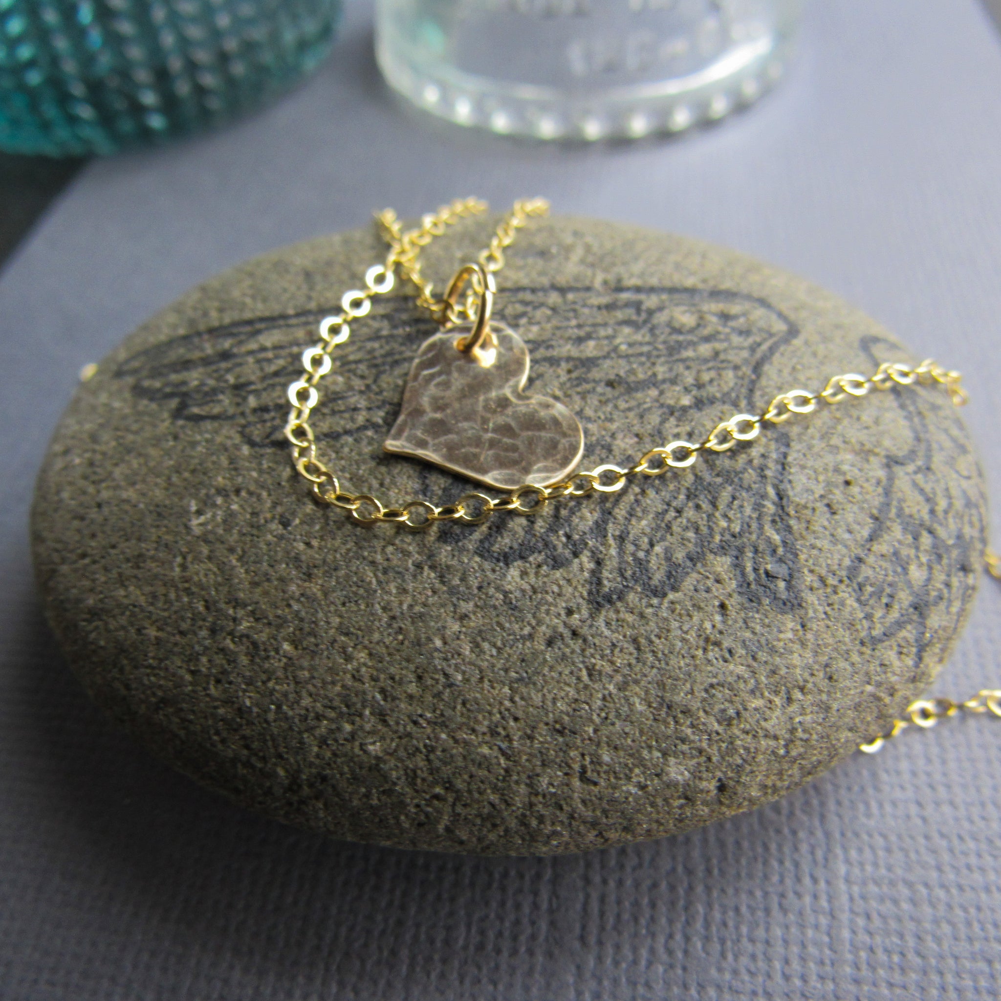 14K gold filled  is heart is hammered to sparkle and catch the light.