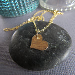 14K gold filled  is heart is hammered to sparkle and catch the light.